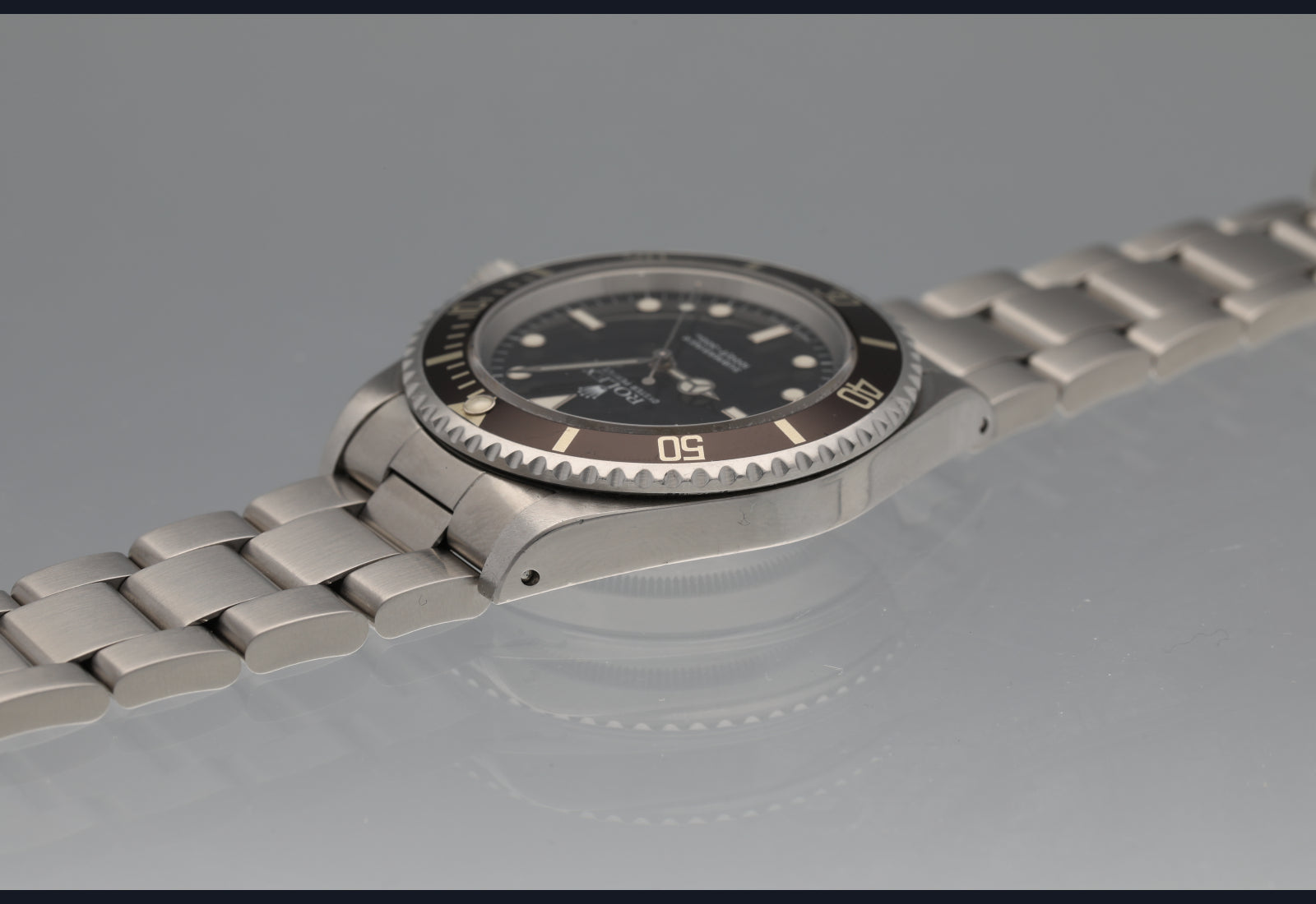 14060 Sharp looking non date sub brown bezel