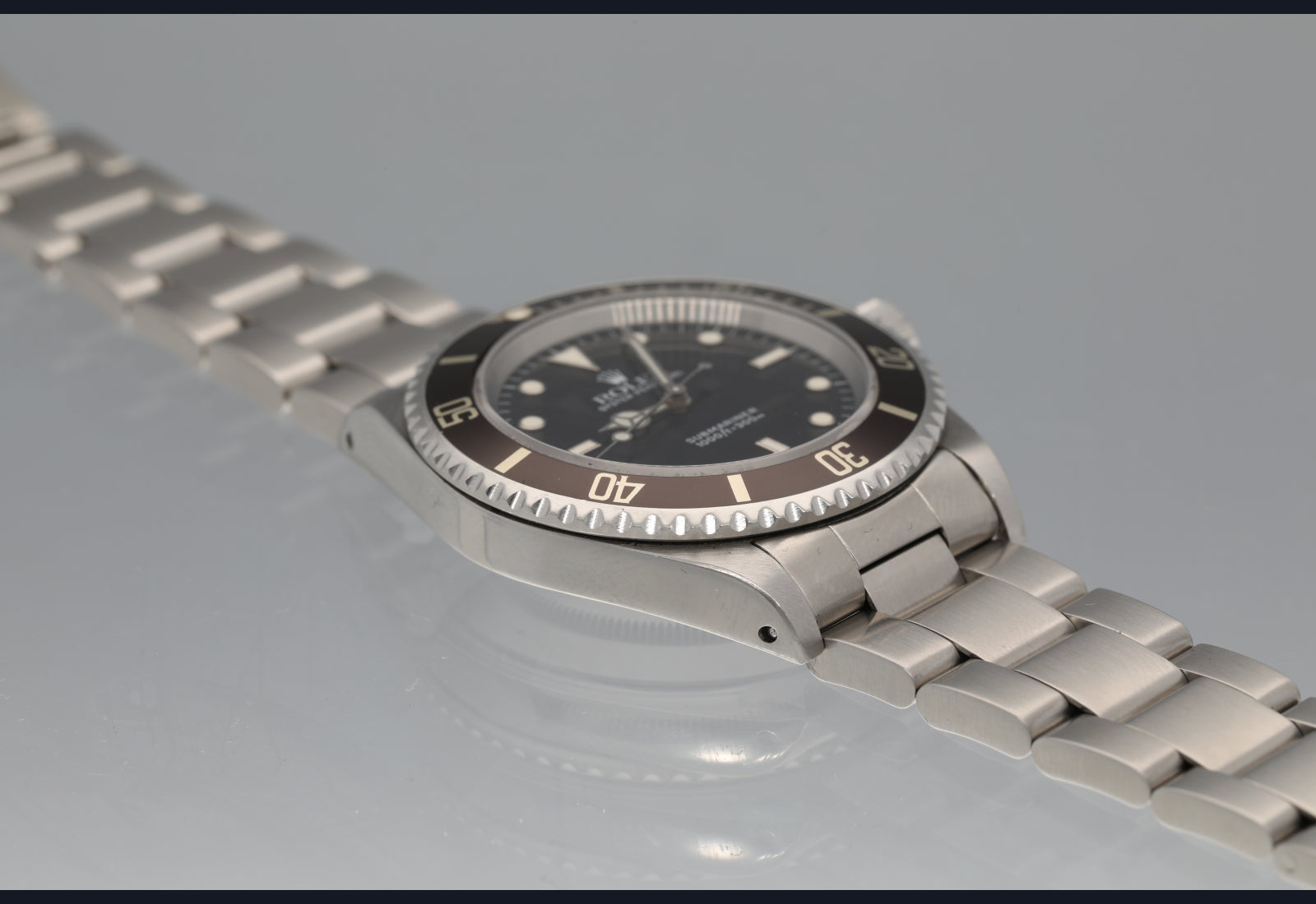 14060 Sharp looking non date sub brown bezel