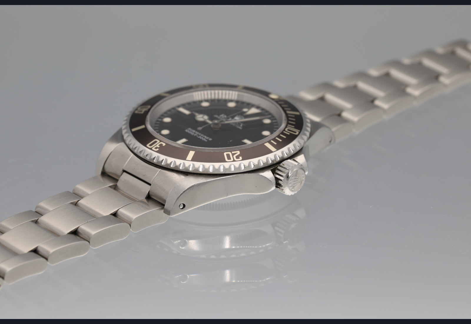 14060 Sharp looking non date sub brown bezel