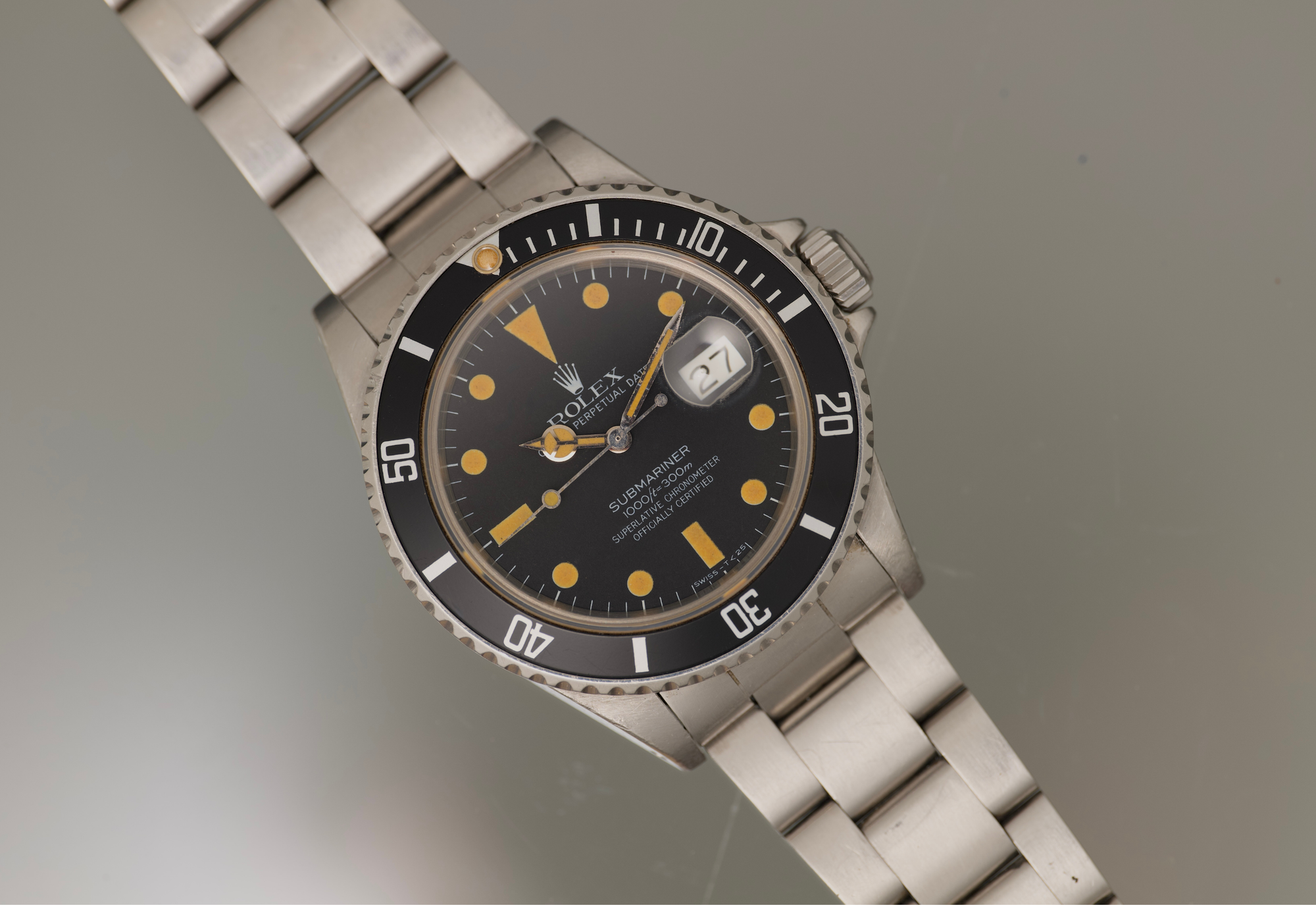 1982 Transitional Submariner date with orange patina and unpolished case