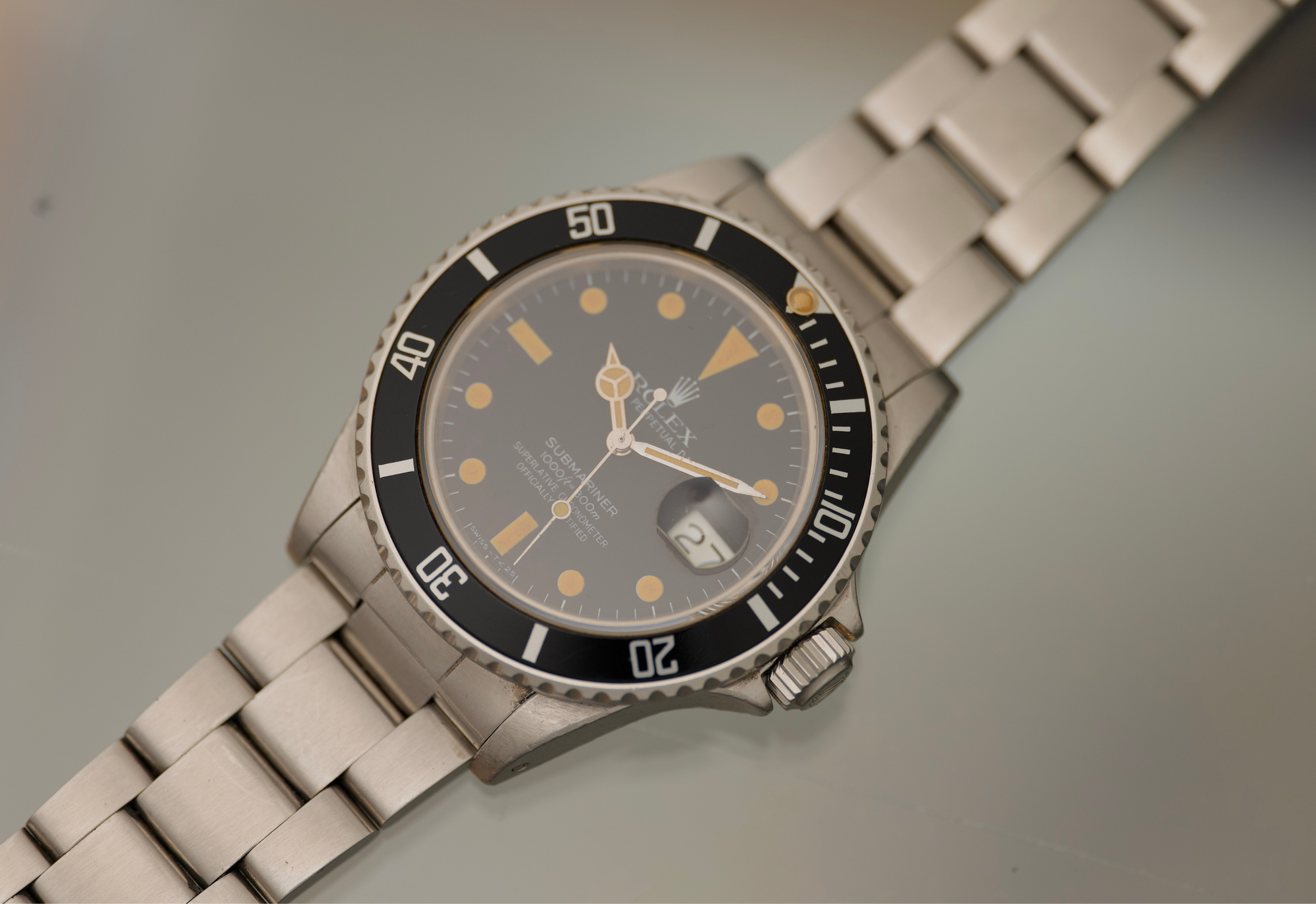 1982 Transitional Submariner date with orange patina and unpolished case