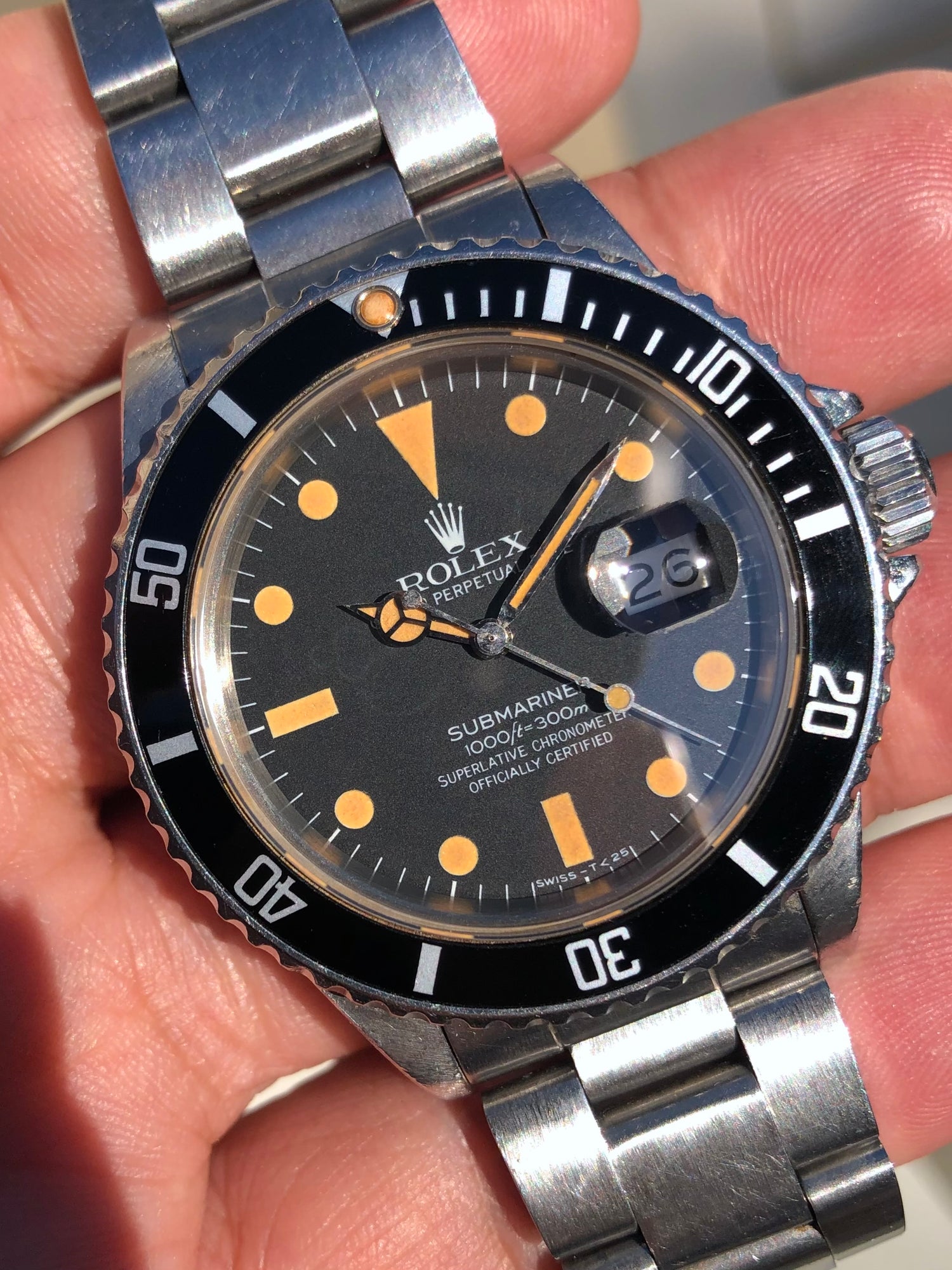 1982 Transitional Submariner date with orange patina and unpolished case