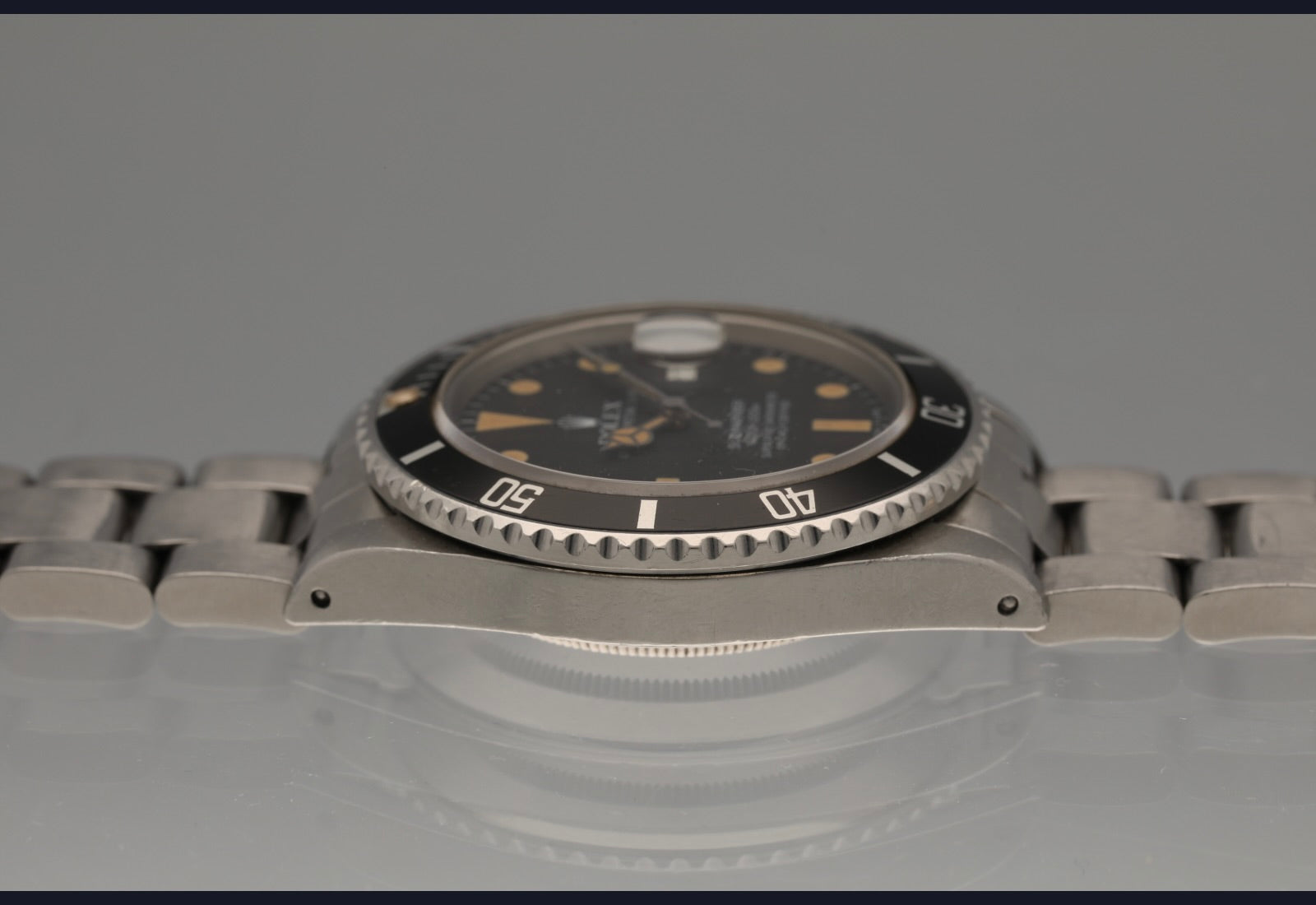 1982 Transitional Submariner date with orange patina and unpolished case