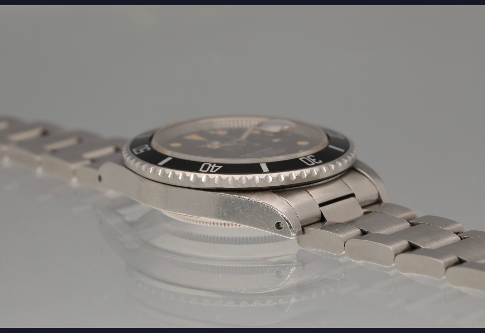 1982 Transitional Submariner date with orange patina and unpolished case
