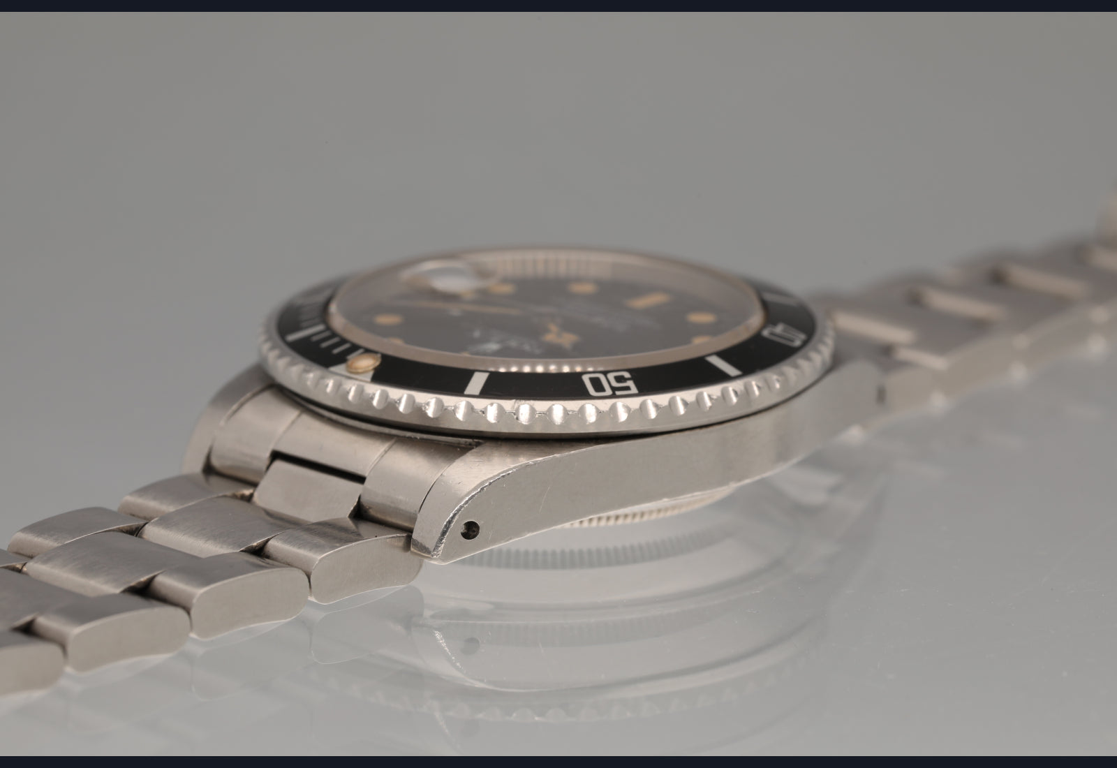 1982 Transitional Submariner date with orange patina and unpolished case