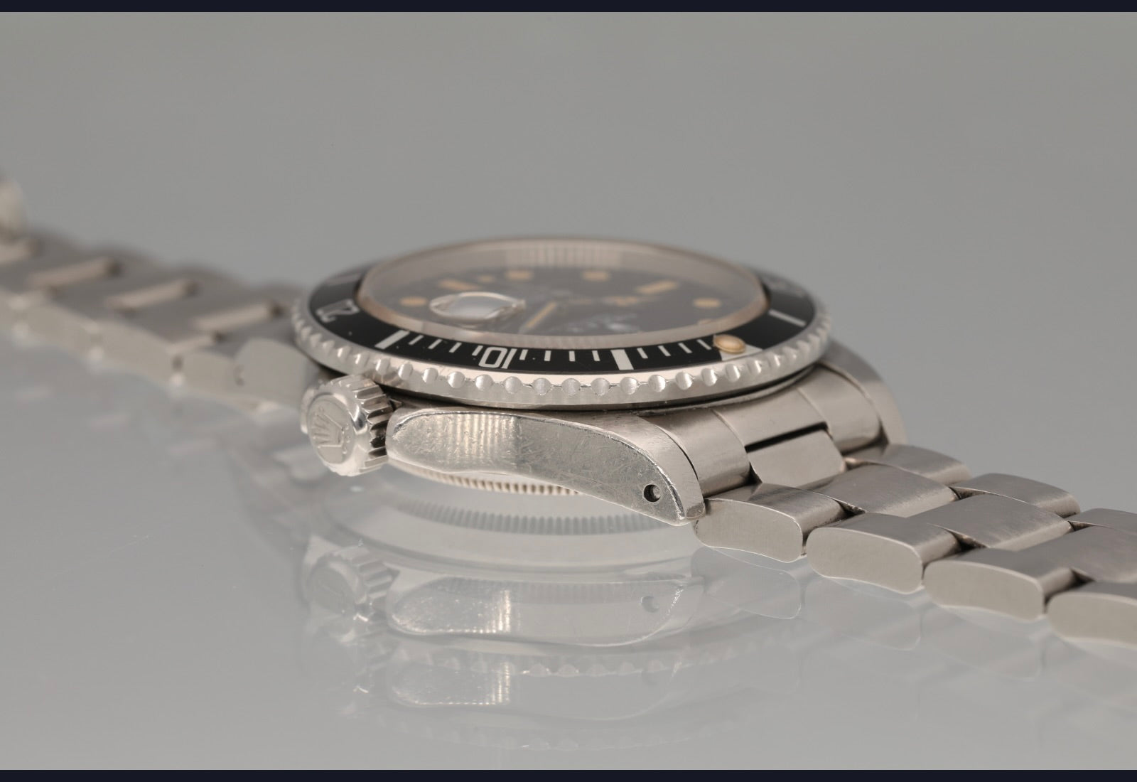 1982 Transitional Submariner date with orange patina and unpolished case