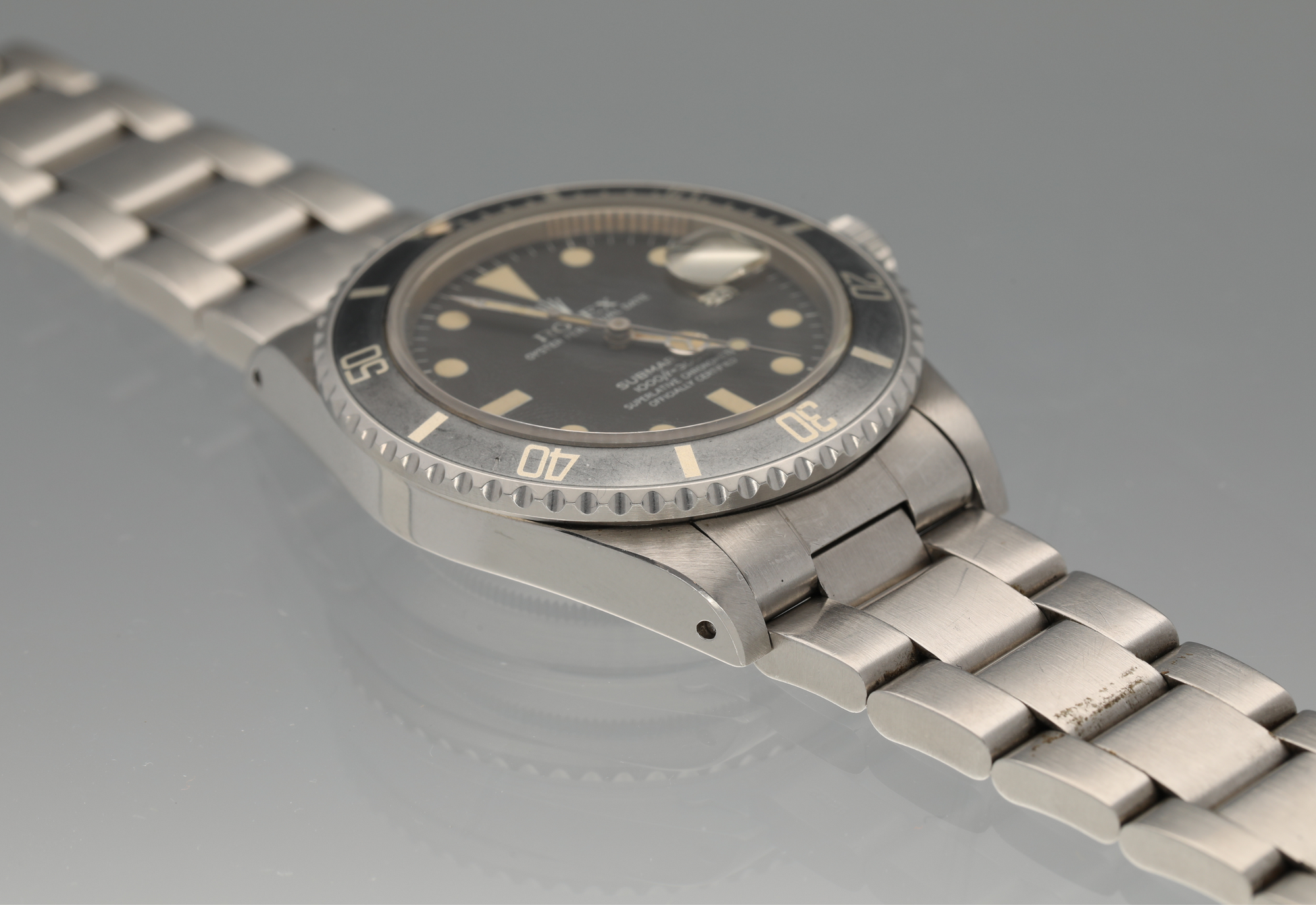 Rolex 16800 super mint diver on the grey scale `
