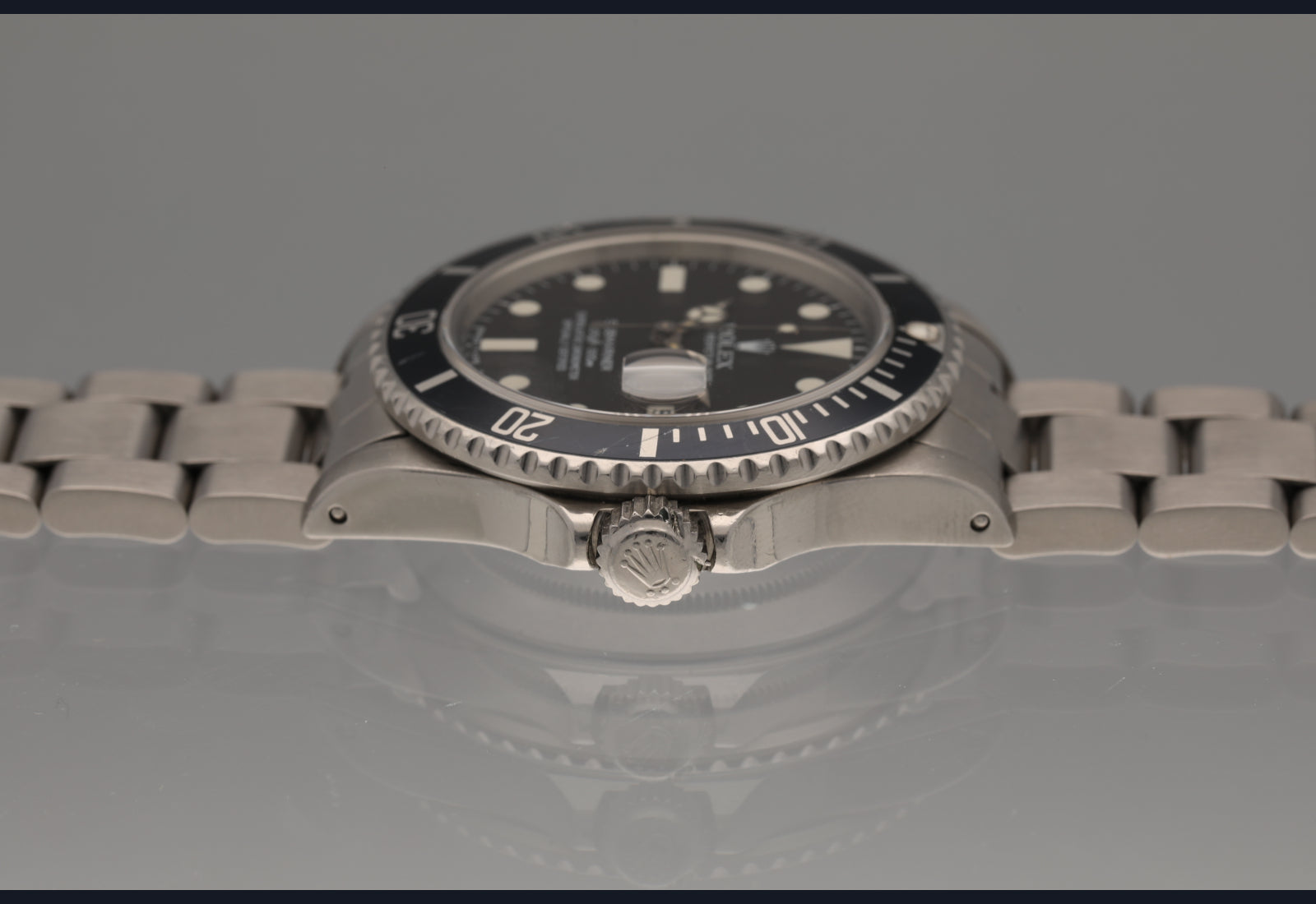 Snow White Transitional 16800 Submariner with a Tropical Blue insert