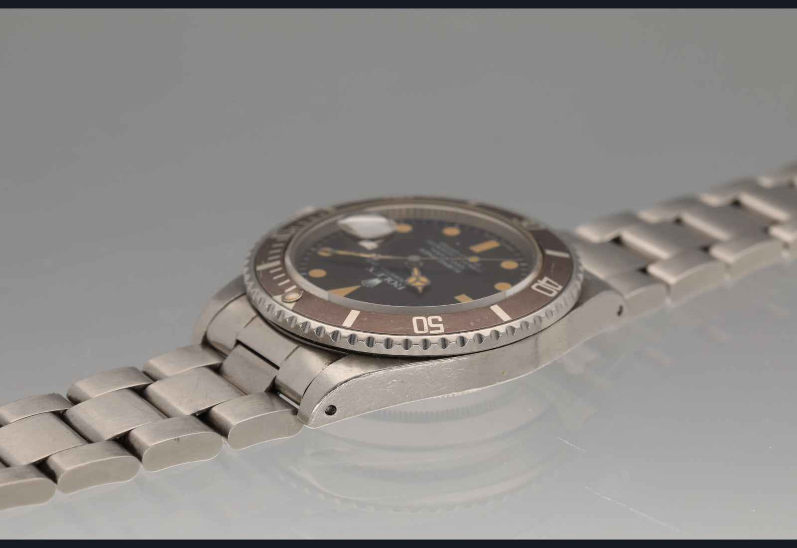 1982 Rolex Transitional Submariner super pumpkin patina vs matte brown bezel