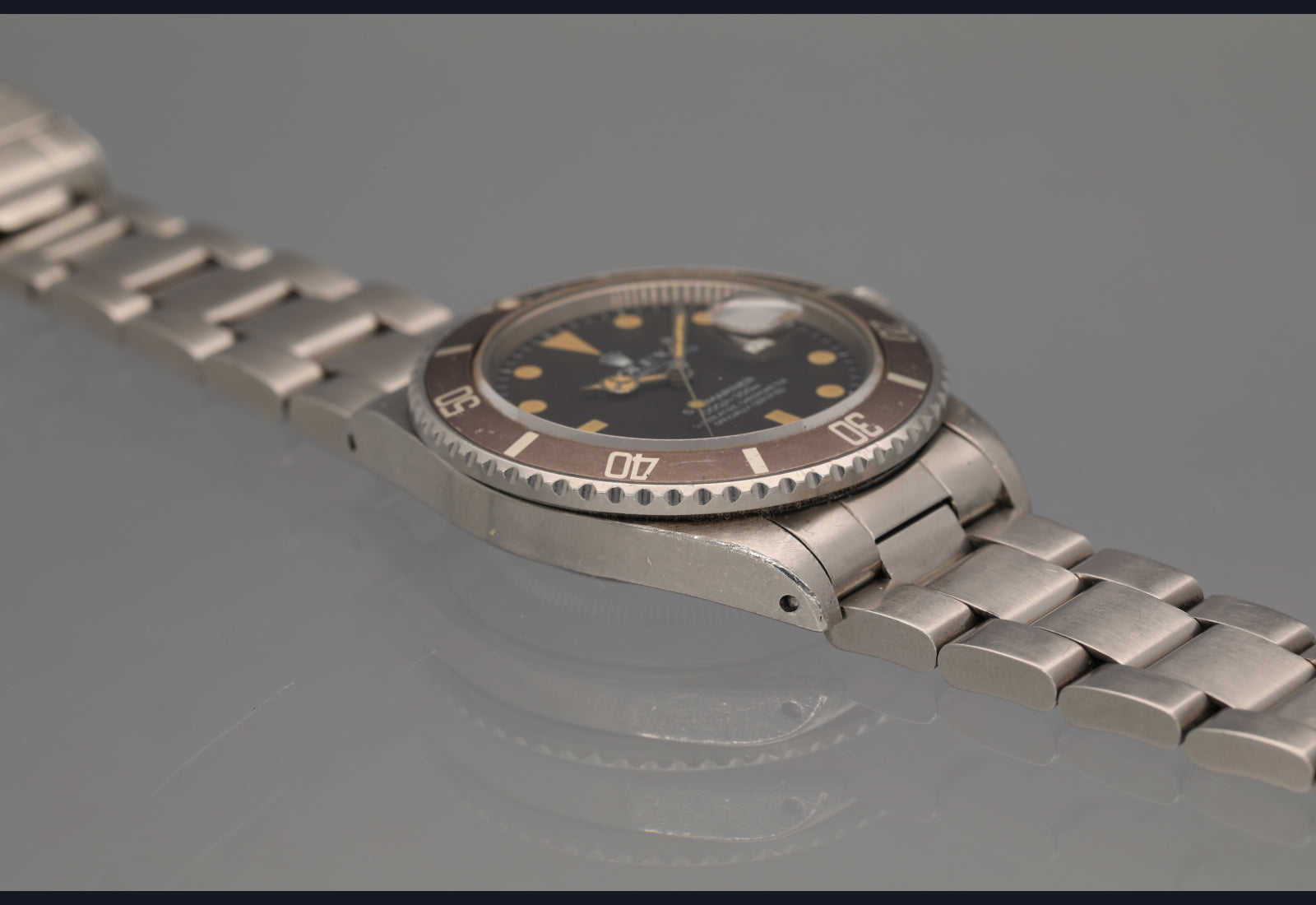 1982 Rolex Transitional Submariner super pumpkin patina vs matte brown bezel