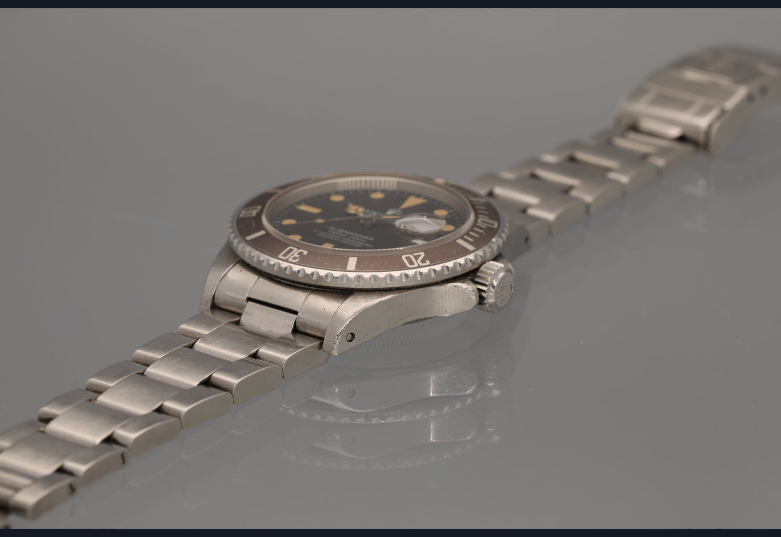 1982 Rolex Transitional Submariner super pumpkin patina vs matte brown bezel