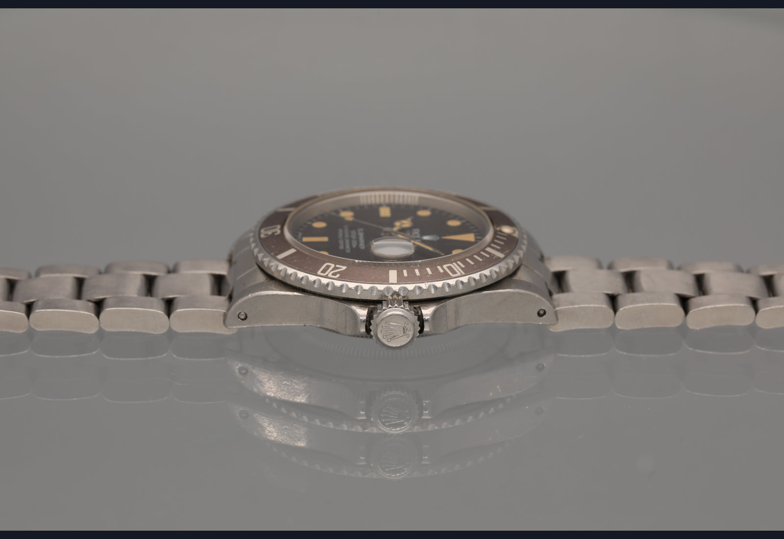 1982 Rolex Transitional Submariner super pumpkin patina vs matte brown bezel