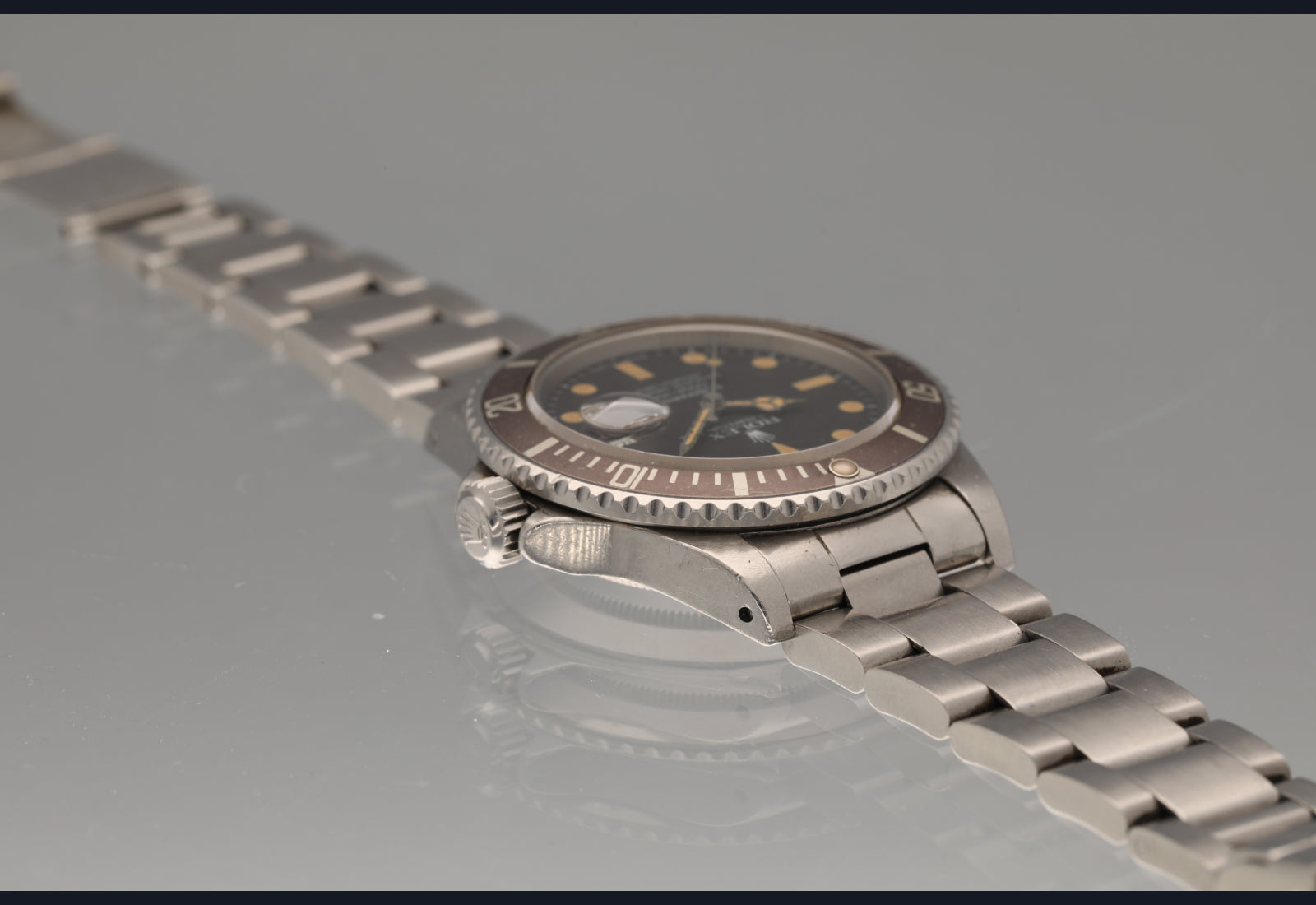 1982 Rolex Transitional Submariner super pumpkin patina vs matte brown bezel