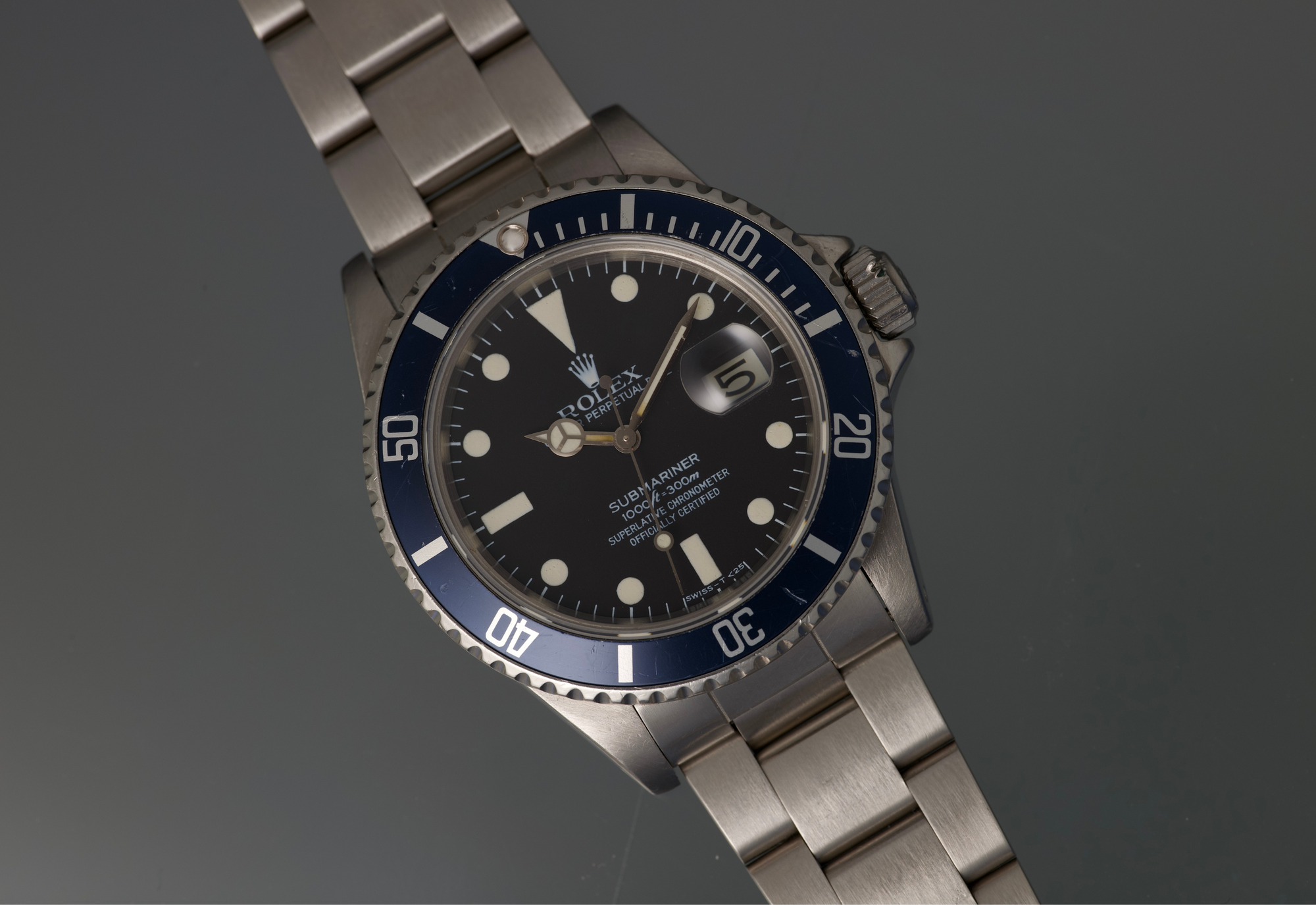 Snow White Transitional 16800 Submariner with a Tropical Blue insert