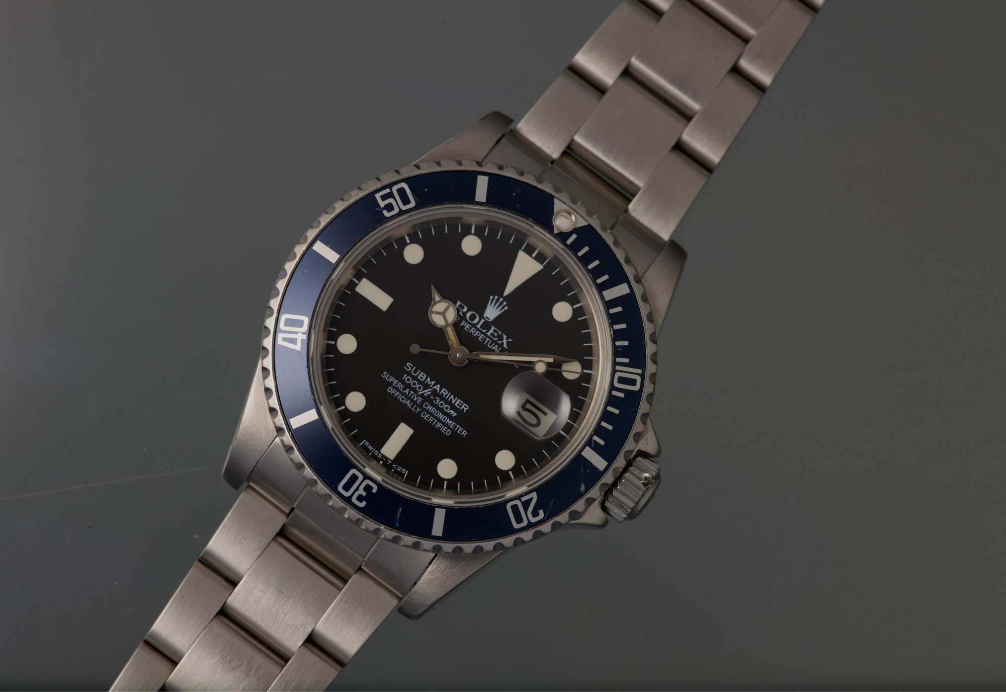 Snow White Transitional 16800 Submariner with a Tropical Blue insert