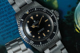 1986 5513 Submariner non-date with dark patina and box and papers.