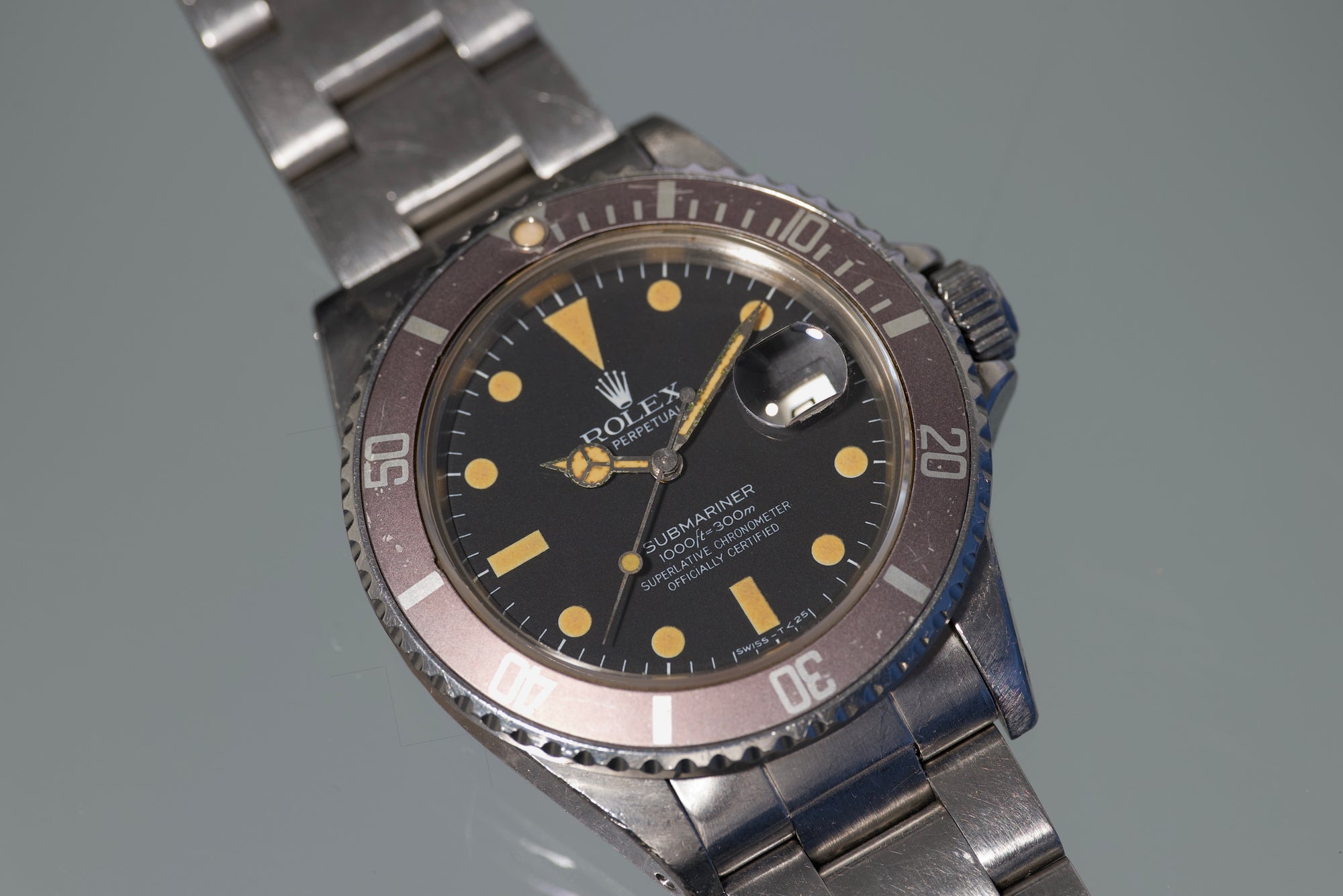 1982 Rolex Transitional Submariner super pumpkin patina vs matte brown bezel