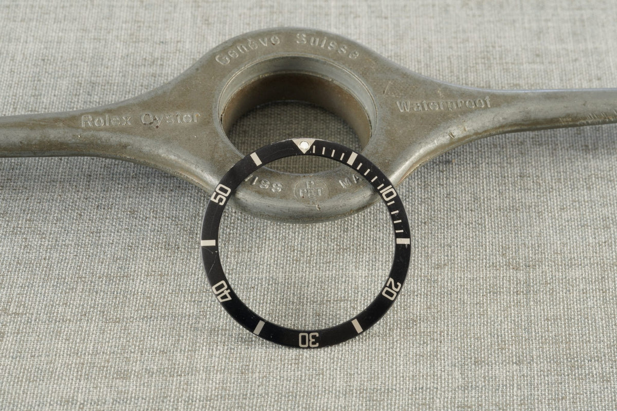 Mid font bezel insert faded